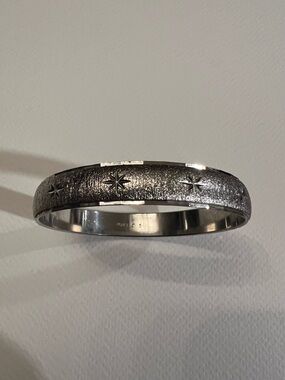 Monet Star Engraved Silver-tone Bangle Bracelet